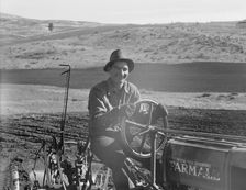 Young farmer, member of Ola self-help sawmill co-op, plowing..., Gem County, Idaho, 1939. Creator: Dorothea Lange