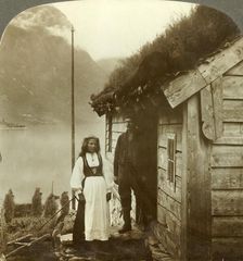 Young farmers of the Nordfjord country - before their cottage home, Norway c1905. Creator: Unknown