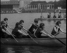 Young Female Civilians Wearing a Team Sport Outfit in a Rowing Race, an Audience Is Seen on..., 1920 Creator: British Pathe Ltd