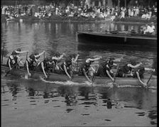 Young Female Civilians Wearing a Team Sport Outfit in a Rowing Race, an Audience Is Seen on..., 1920 Creator: British Pathe Ltd