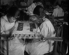 Young Female Civilians Learning Embroidery in an Arts Class, 1920. Creator: British Pathe Ltd