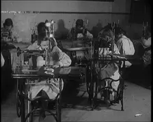 Young Female Civilians Operating Sewing Machines in an Arts Class, 1920. Creator: British Pathe Ltd