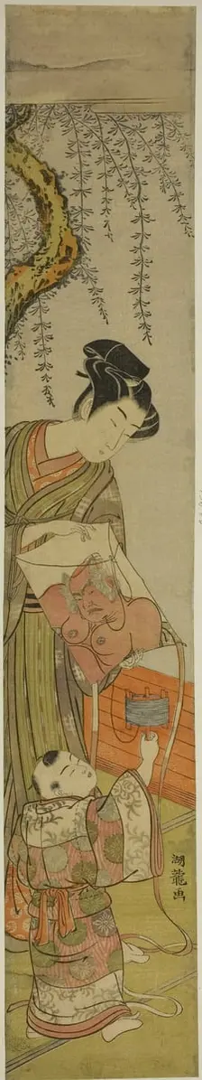 Young Man Holds a Kite for a Child, c. 1774. Creator: Isoda Koryusai