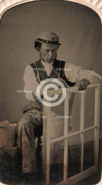 Young Man Painting Window Frame, 1860s-80s. Creator: Unknown.