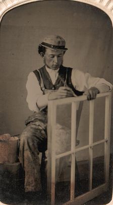 Young Man Painting Window Frame, 1860s-80s. Creator: Unknown