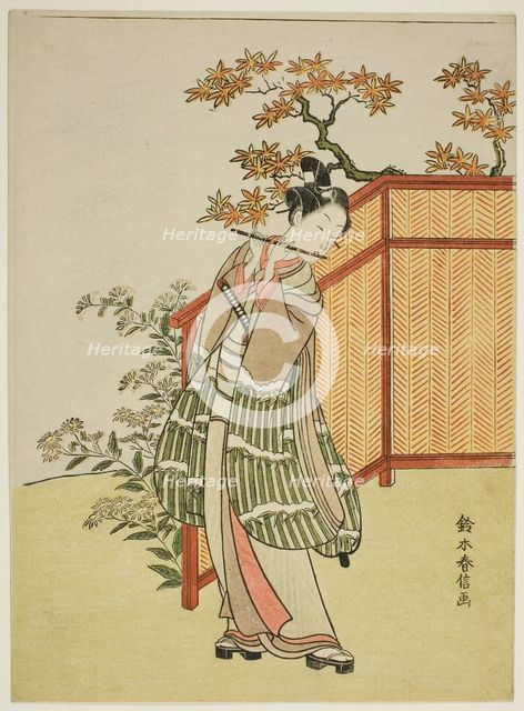 Young Man Playing the Flute Beside a Fence, c. 1767. Creator: Suzuki Harunobu.