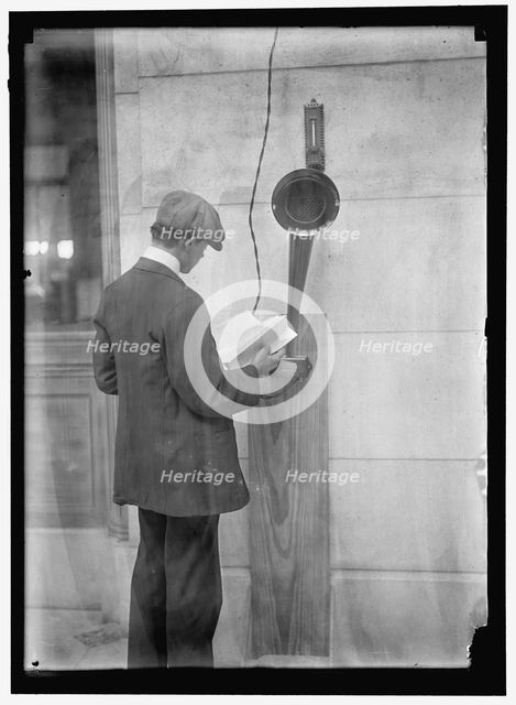 Young man standing near speaker, between 1910 and 1917. Creator: Harris & Ewing.