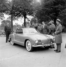 Young men admire the new Volkswagen Karmann Ghia, Landskrona, Sweden, 1955