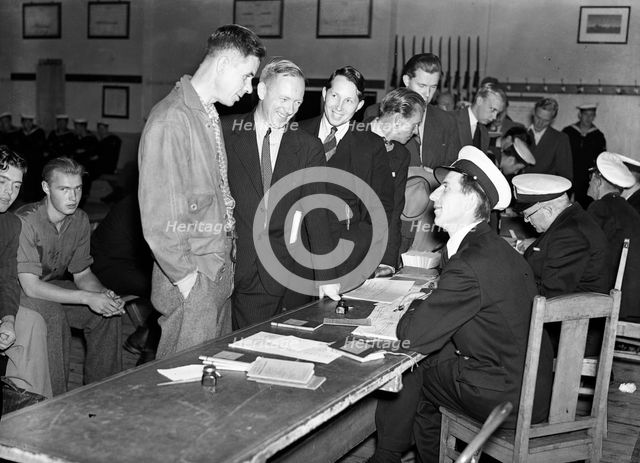 Young men enrolling for compulsory military service, Skepsholmen, Stockholm, 8th September 1939. Creator: Karl Sandels.