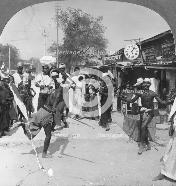 Young men performing a sword dance, Burma, 1908. Artist: Stereo Travel Co