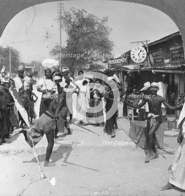 Young men performing a sword dance, Burma, 1908. Artist: Stereo Travel Co