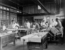 Young men training in wheel wrighting at Hampton Institute, Hampton, Virginia, 1899 or 1900. Creator: Frances Benjamin Johnston