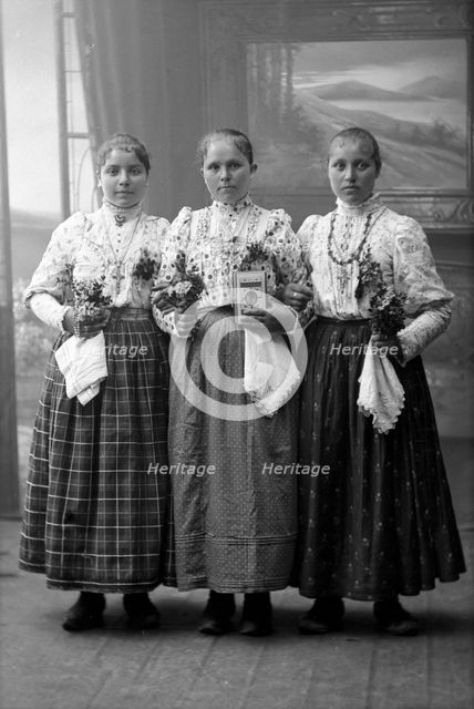 Young migrant workers from Galicia in traditional costume, Landskrona, Sweden, 1910. Creator: Unknown.