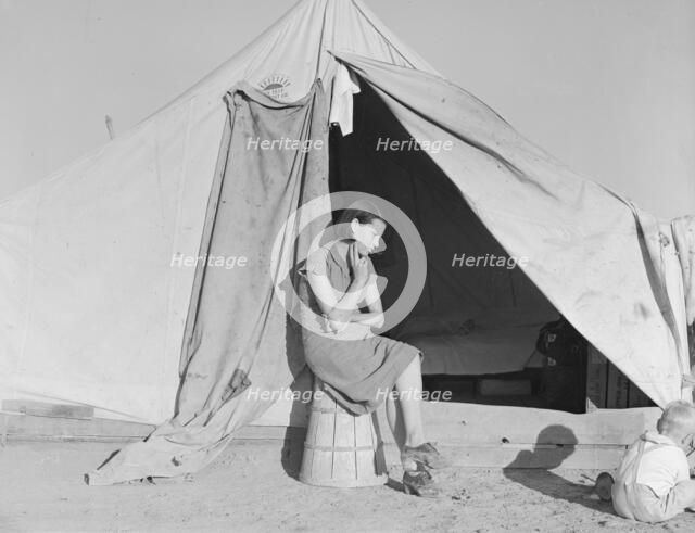 Young migrant mother..., FSA emergency camp, Calipatria, California, 1939. Creator: Dorothea Lange.