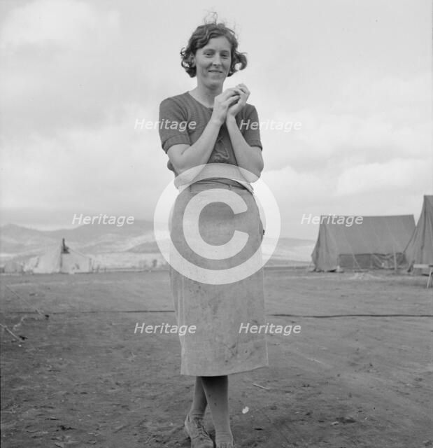Young migrant mother has just finished washing, Merrill FSA camp, Klamath County, Oregon, 1939. Creator: Dorothea Lange.