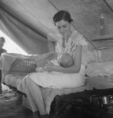 Young migrant mother with six weeks old baby born in a hospital with aid..., near Westley, CA, 1939. Creator: Dorothea Lange