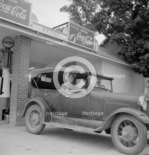Young North Carolinian in old Ford, Person County, North Carolina, 1939. Creator: Dorothea Lange.
