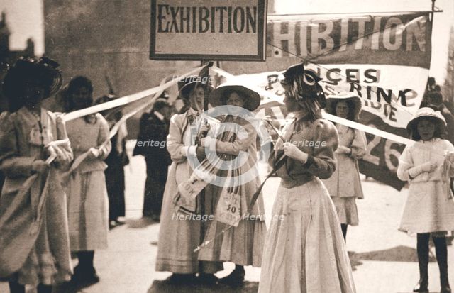 Young suffragettes promote the fortnight-long Women's Exhibition, London, 13 May 1909. Creator: Unknown.