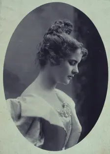Young woman, facing right, head-and-shoulders profile portrait, c1900. Creator: Davis & Sanford