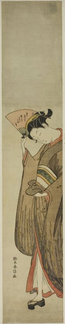 Young Woman Holding a Fan, c. 1769. Creator: Suzuki Harunobu