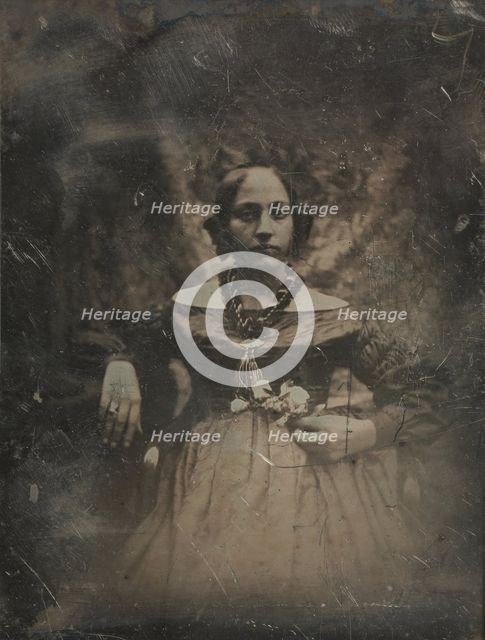 Young woman holding a flower, ca. 1842. Creator: Joseph Philibert Girault De Prangey.