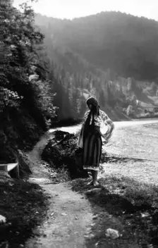 Young woman on a mountain footpath, Bistrita Valley, Moldavia, north-east Romania, c1920-c1945. Artist: Adolph Chevalier