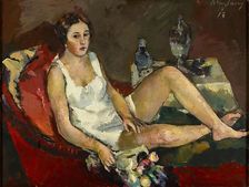 Young woman on red sofa, 1913. Creator: Anton Faistauer