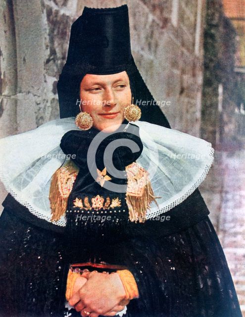 Young woman of Lindhorst in local costume for a fete, Germany, 1942. Artist: Unknown