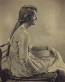 Young woman seated, looking right, 1918. Creator: Unknown