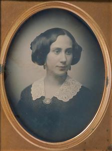 Young Woman Wearing Lace Collar and Brooch, 1850s. Creator: Attributed to Southworth and Hawes