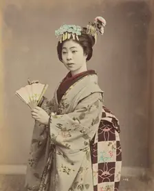 Young Woman with Fan, 1870s-1890s. Creator: Kusakabe Kimbei
