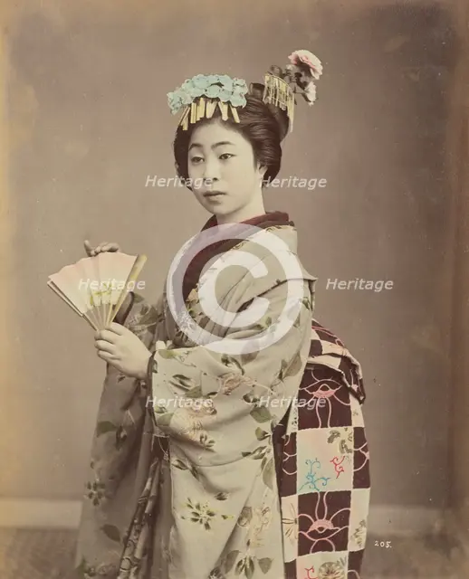 Young Woman with Fan, 1870s-1890s. Creator: Kusakabe Kimbei.
