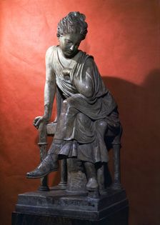 Young woman with injured arm, piece in marble