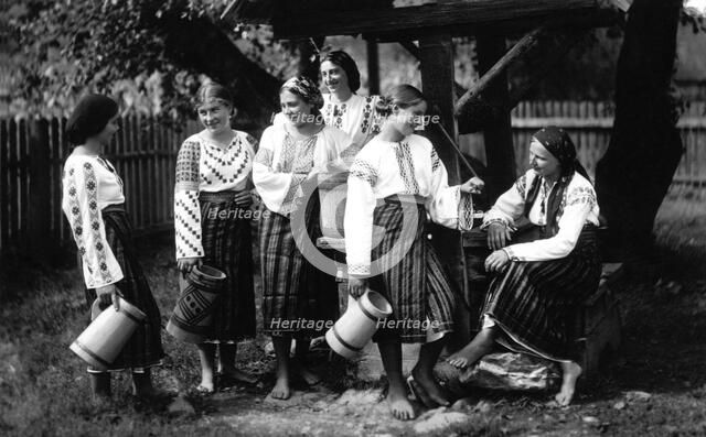 Young women chatting, Bistrita Valley, Moldavia, north-east Romania, c1920-c1945. Artist: Adolph Chevalier