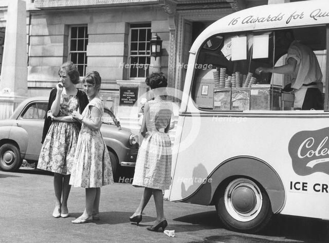 Young women by an ice cream van, c1960.