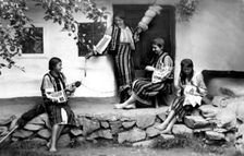 Young women spinning and sewing, Bistrita Valley, Moldavia, north-east Romania, c1920-c1945. Artist: Adolph Chevalier