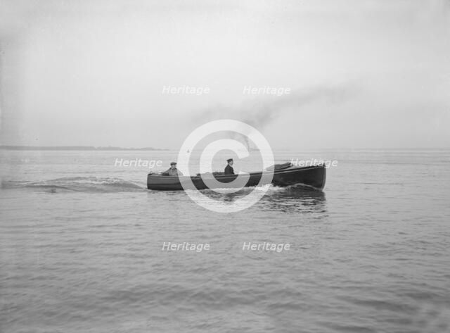 Yacht's motor launch under way, 1914. Creator: Kirk & Sons of Cowes.