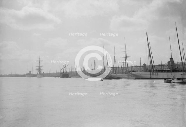 Yachts tying up at Cowes. Creator: Kirk & Sons of Cowes.