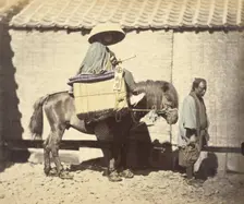Yakonin Travelling on the Tokaido Road, about 1868. Creator: Felice Beato