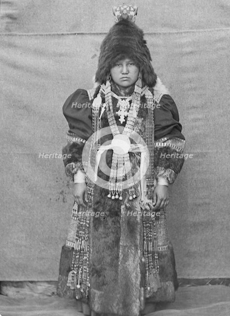 Yakut woman in festive attire, 1890. Creator: Unknown.