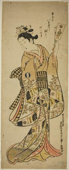 Yaoya Oshichi holding a battledore paddle, c. 1744/51. Creator: Okumura Masanobu