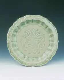 Yaozhou celadon saucer with moulded and carved floral decoration, Jin dynasty, China, 12th century. Creator: Unknown