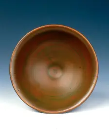 Yaozhou stoneware tea bowl with persimmon red glaze, Jin dynasty, China, 12th century. Creator: Unknown