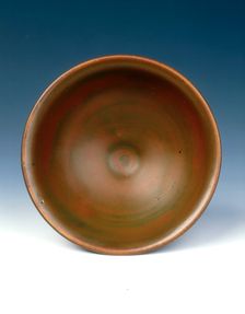 Yaozhou stoneware tea bowl with persimmon red glaze, Jin dynasty, China, 12th century. Creator: Unknown
