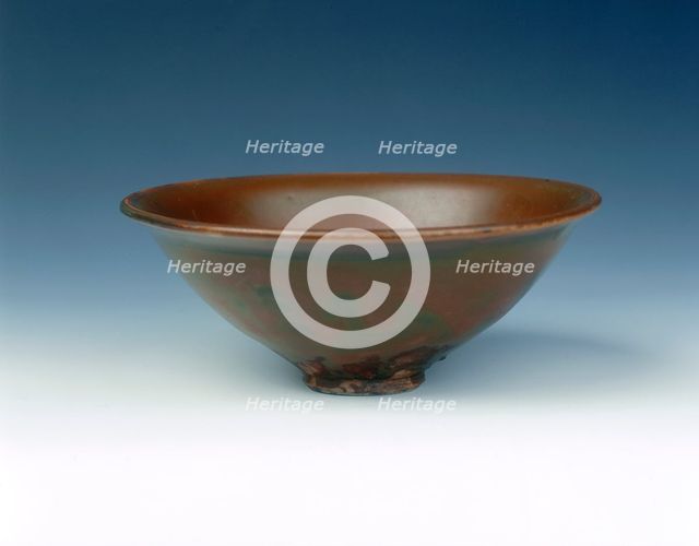 Yaozhou stoneware tea bowl with persimmon red glaze, Jin dynasty, China, 12th century. Creator: Unknown.