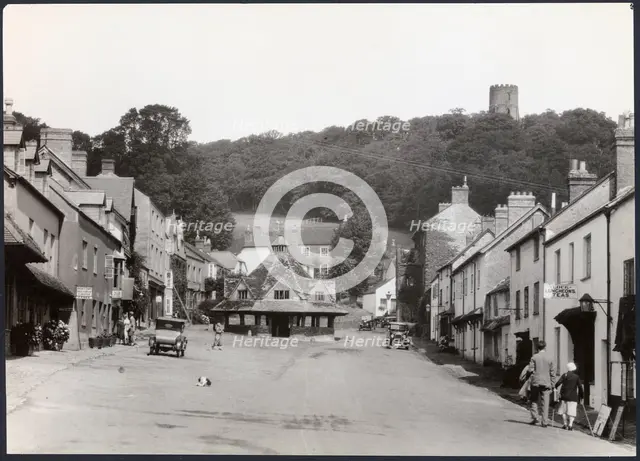 Yarn Market, High Street, Dunster, Somerset, 1925-1935. Creator: J Dixon Scott.