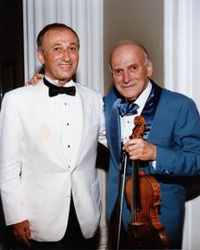 Yehudi Menuhin, American violinist, and Dov Seltzer, Romanian composer, 1992. Creator: Sidney Harris