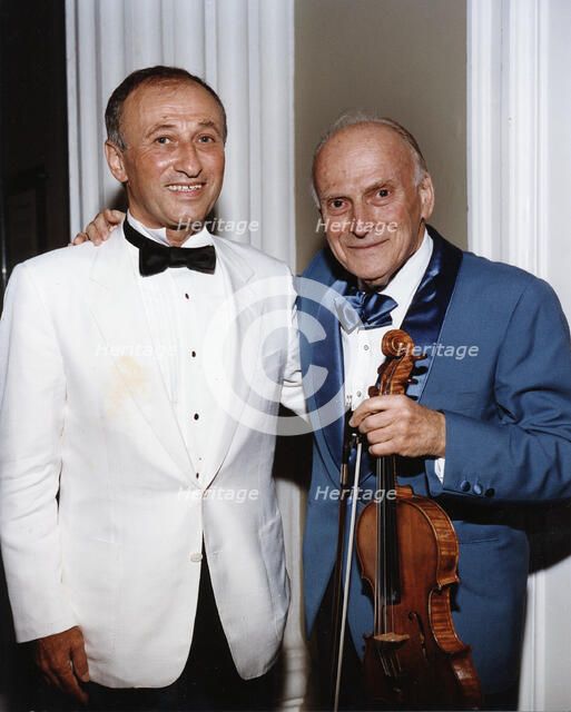 Yehudi Menuhin, American violinist, and Dov Seltzer, Romanian composer, 1992. Artist: Sidney Harris