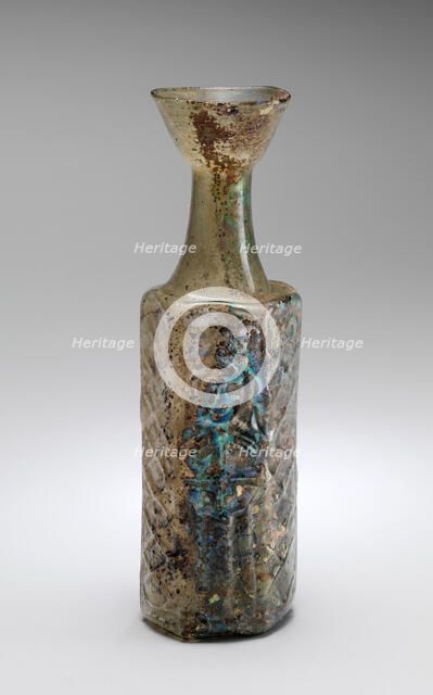 Yellow-Green Hexagonal Glass Bottle with a Stylite Saint, Byzantine, mid-5th-7th century. Creator: Unknown.