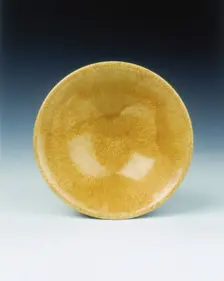 Yellow lead glazed bowl, late Tang dynasty, China, 9th century. Creator: Unknown